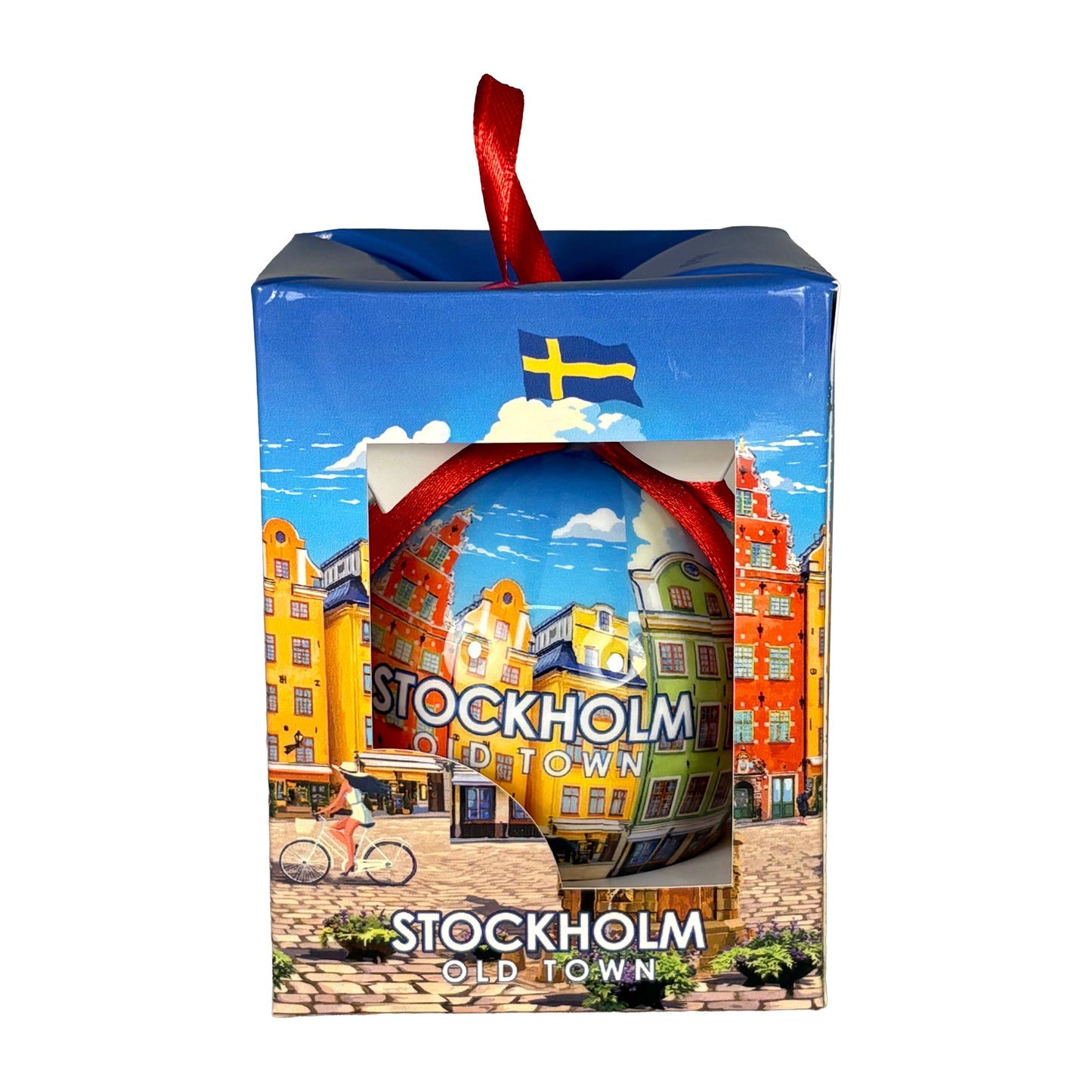 Julgranskula med Stortorget-motiv i matchande presentförpackning. Samma färgstarka design syns på både kula och förpackning.