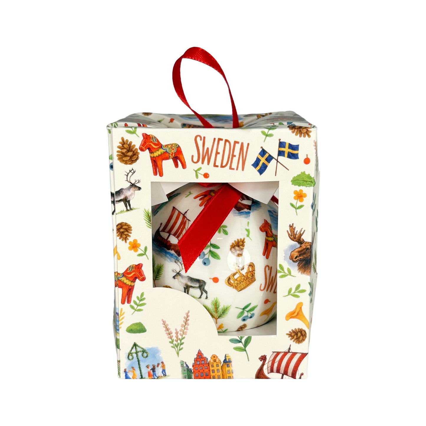 Gräddvit julkula Sweden Symboler i rött band, placerad i en matchande förpackning med samma mönster av svenska klassiska symboler som på kulan, perfekt för present eller förvaring.