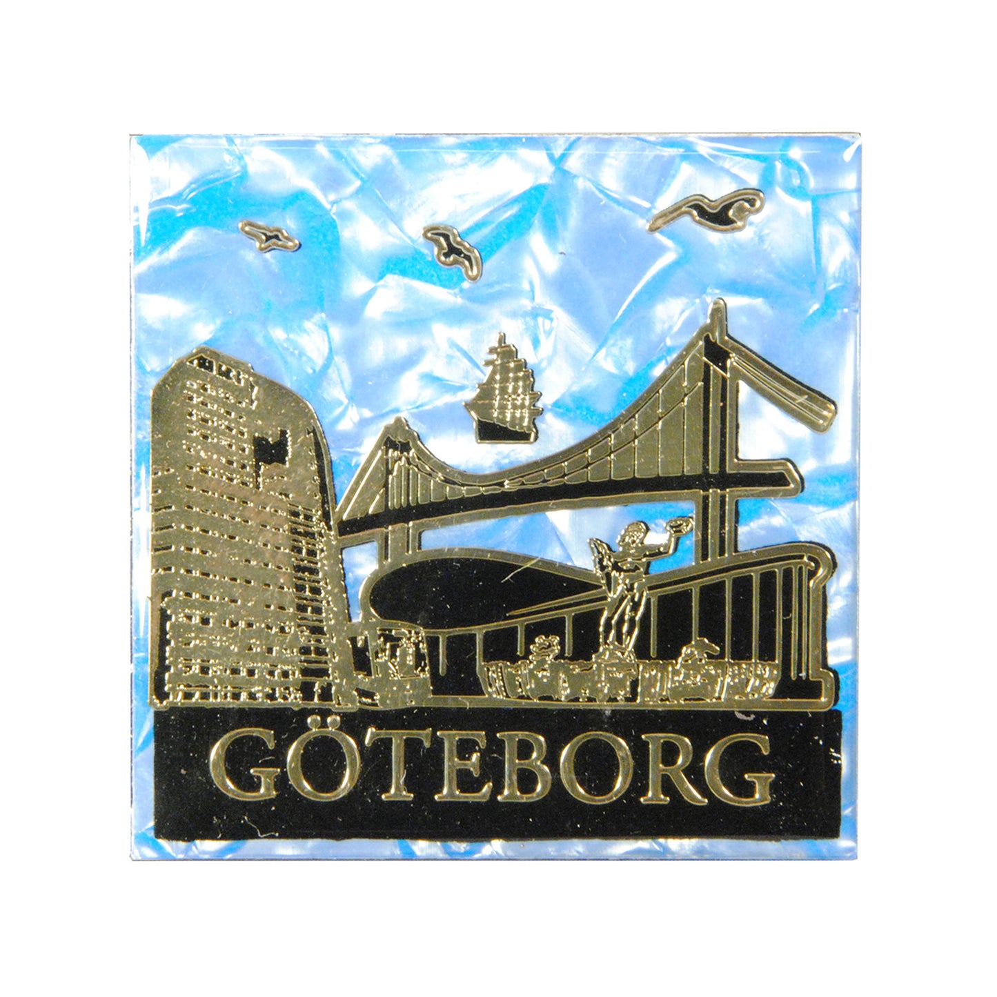 Epoxy-magnet med guldfärgad Göteborgs skyline på blå marmormönstrad bakgrund.