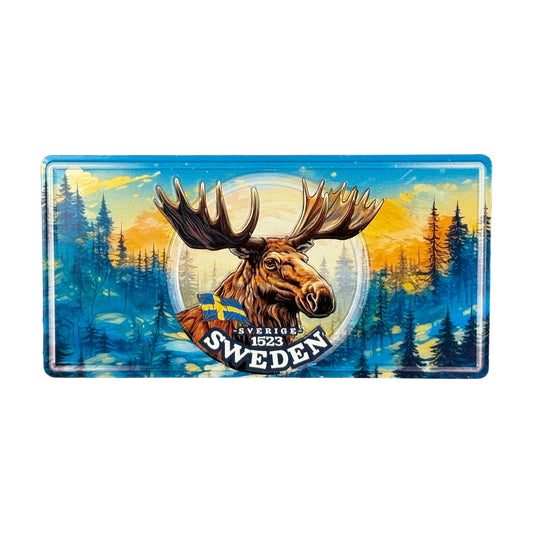 Magnet i form av en amerikansk registreringsskylt med motiv av en älg – svensk souvenir i retrostil
