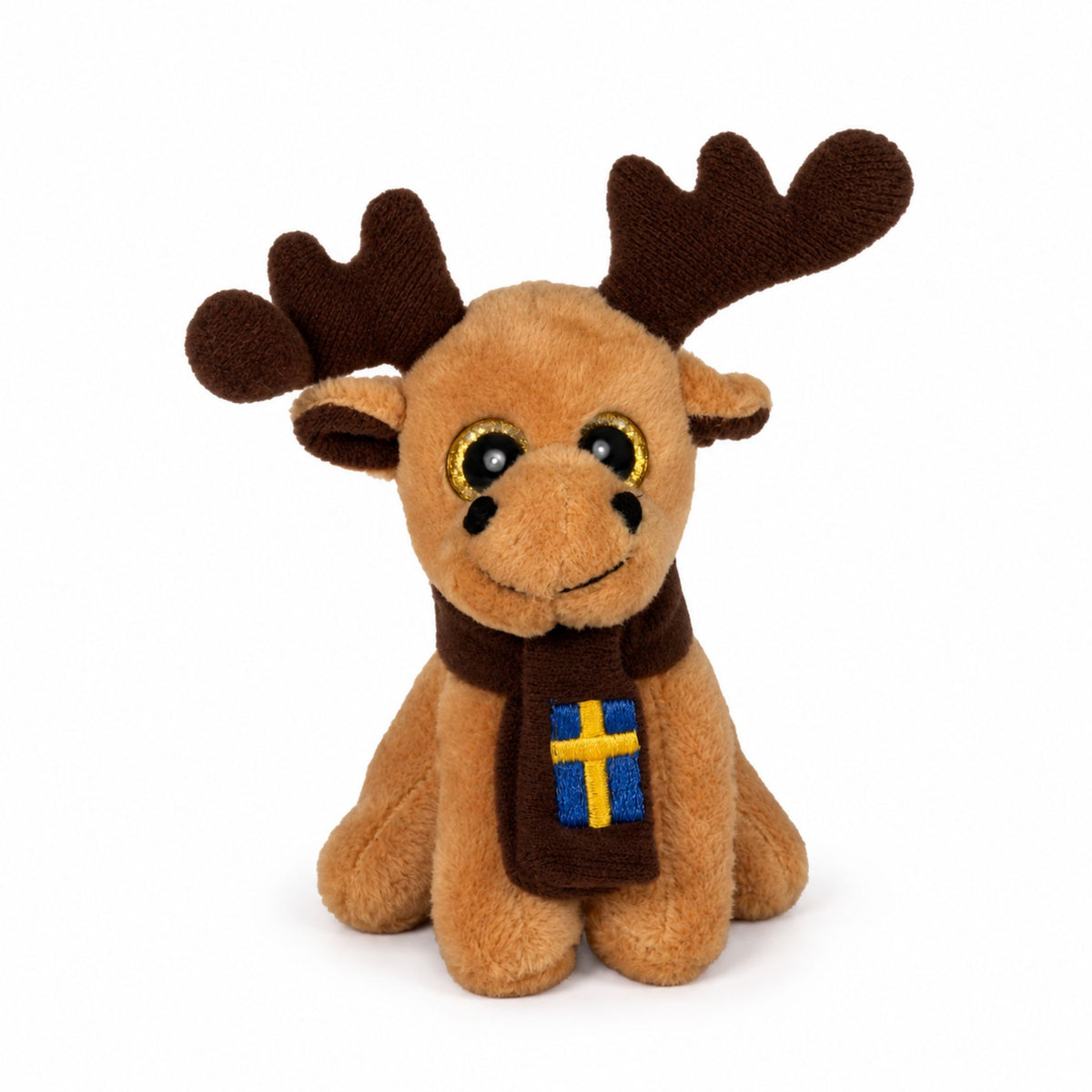 Magnet med beige gosedjursälg iklädd brun halsduk med svenska flaggan.