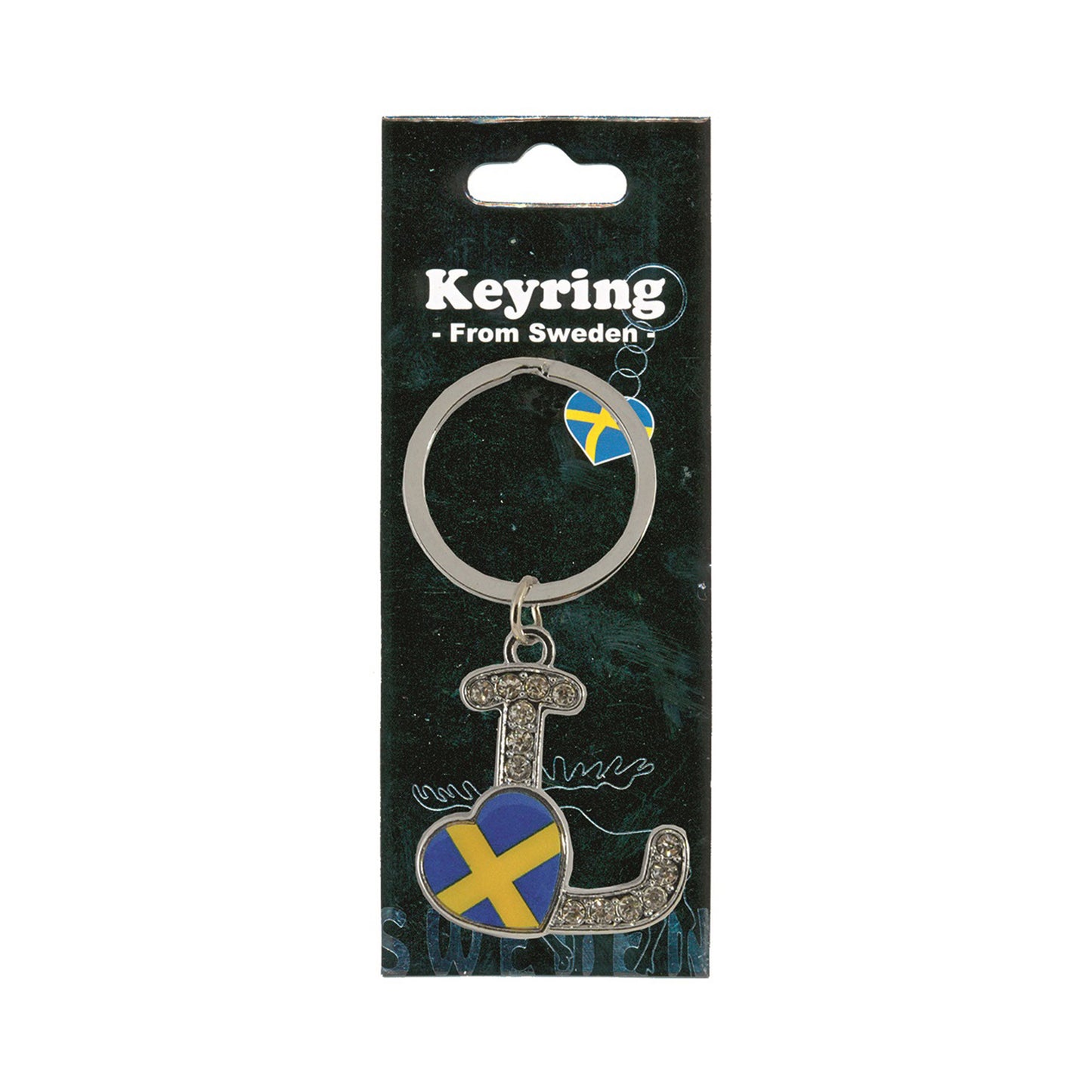 Metallnyckelring med bokstaven L. Bokstaven är dekorerad med glitterstenar. På bokstaven finns även ett hjärta med en svensk flagga. Visas här i sin förpackning. Svart förpackning med texten "Keyring från Sweden" i vitt.