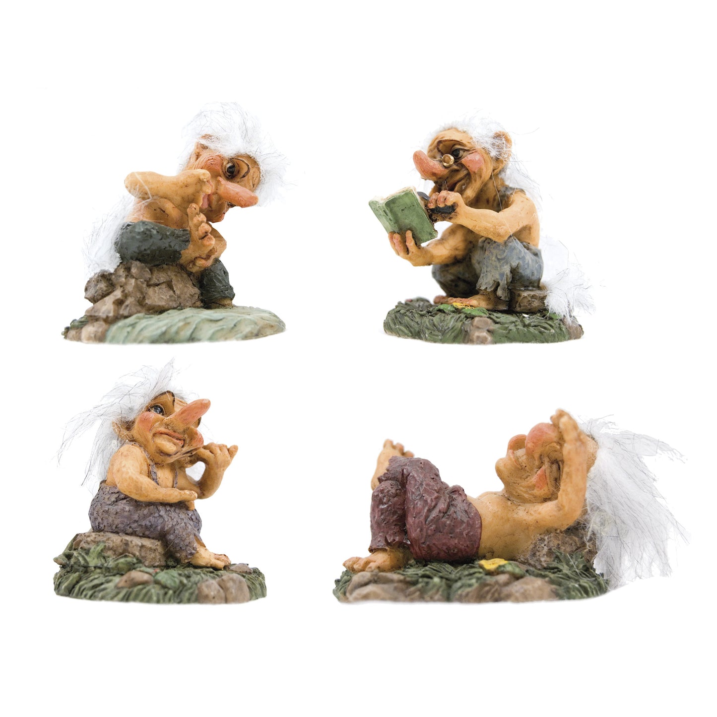 Fyra olika trollfigurer, 7,5 cm höga, med unika uttryck och detaljer.