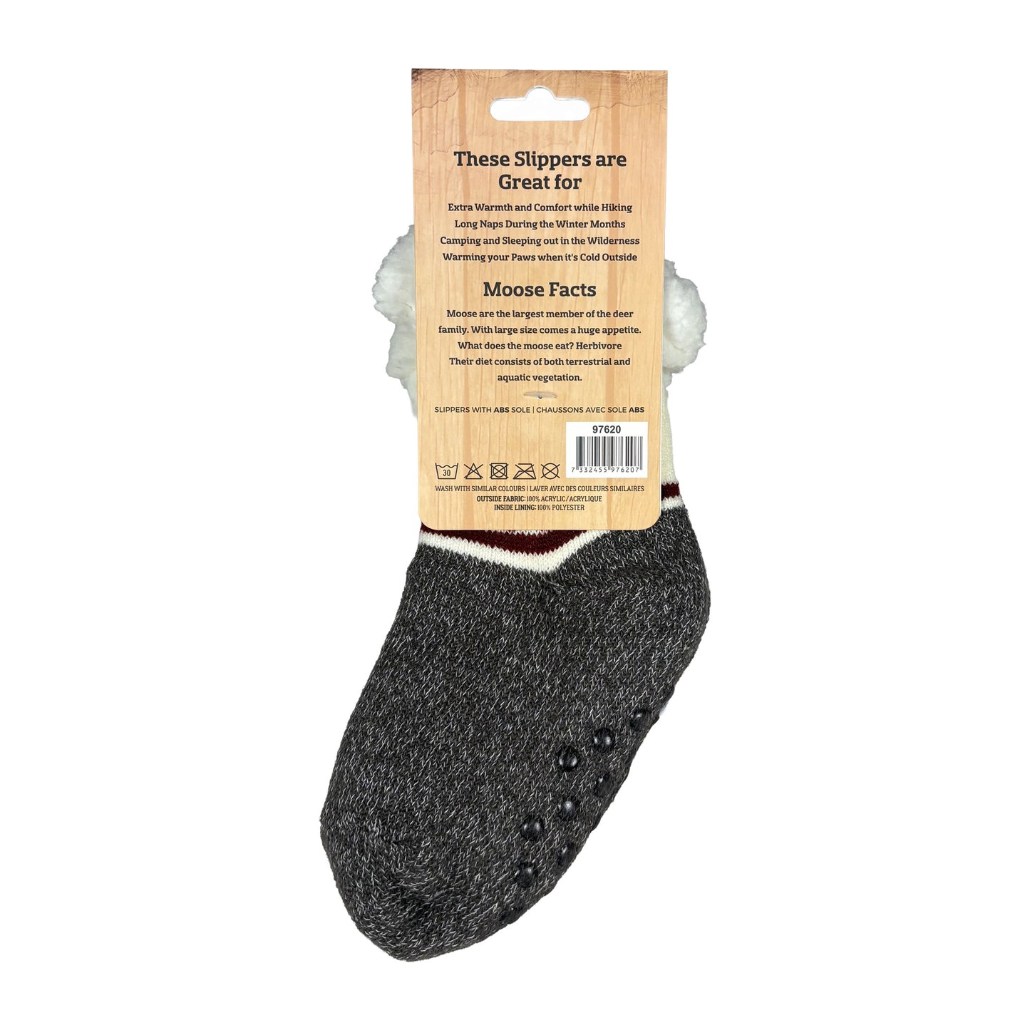 Grå och vita fluffiga babysockor med söt älg, texten 'baby'. Visas här med baksidan av ljusbrun hängetikett. Här finns info om vad sockarna är bra till, en kort faktatext och älgar samt tvättråd.