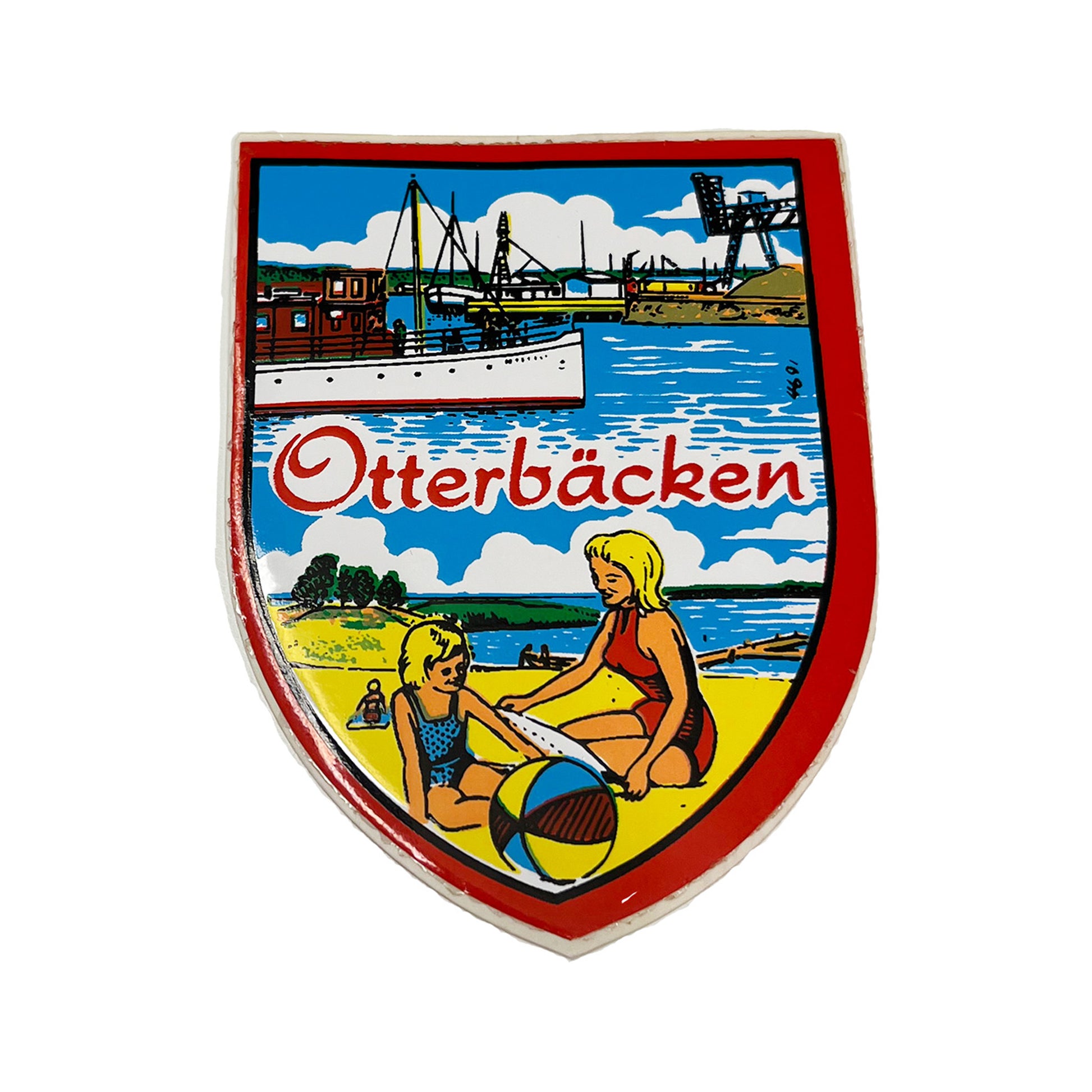 Sköldformad dekal med motiv från Otterbäcken. Storlek 6 x 7,8 cm – en stilfull svensk souvenir med lokal prägel.