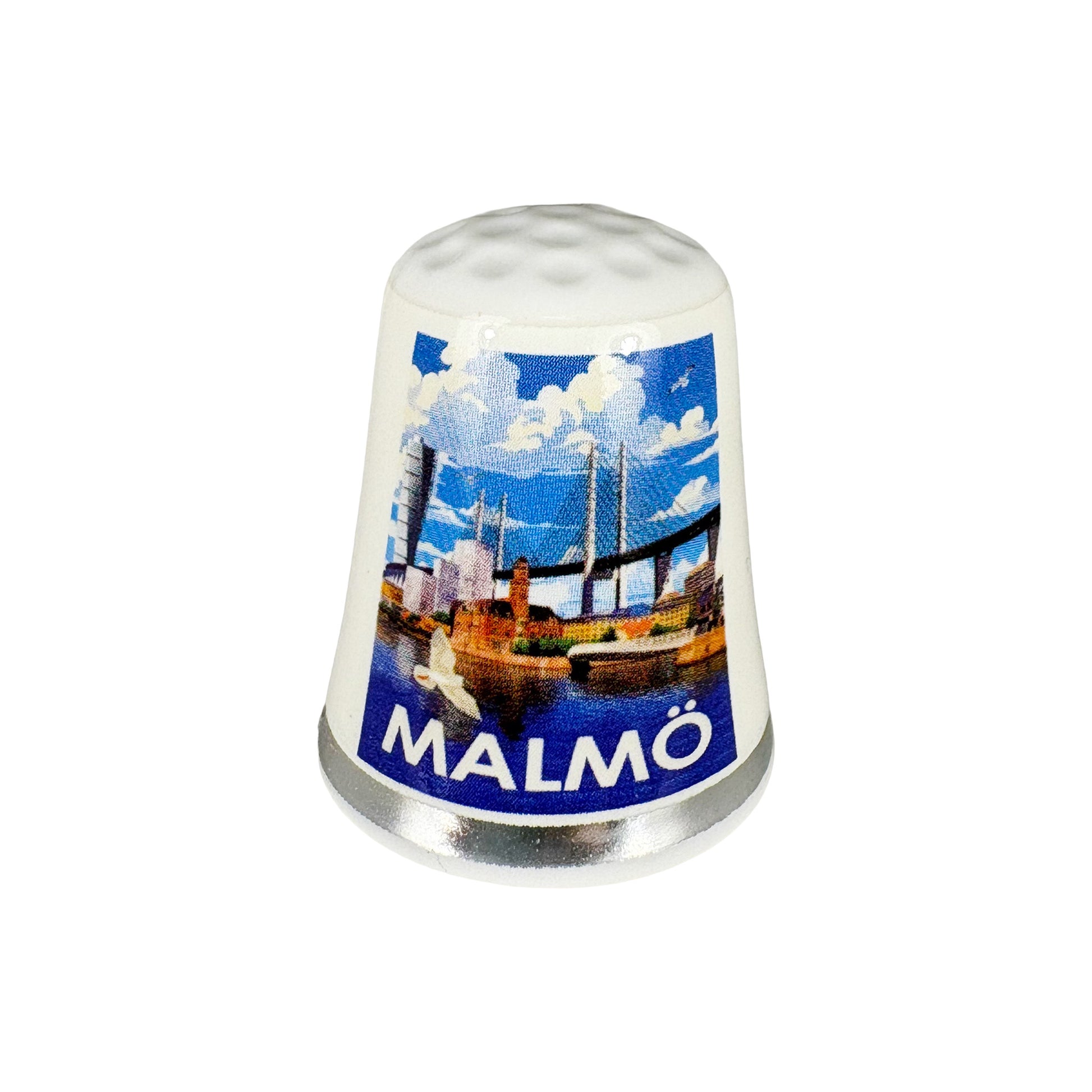 Vit fingerborg med motiv från Malmö. 