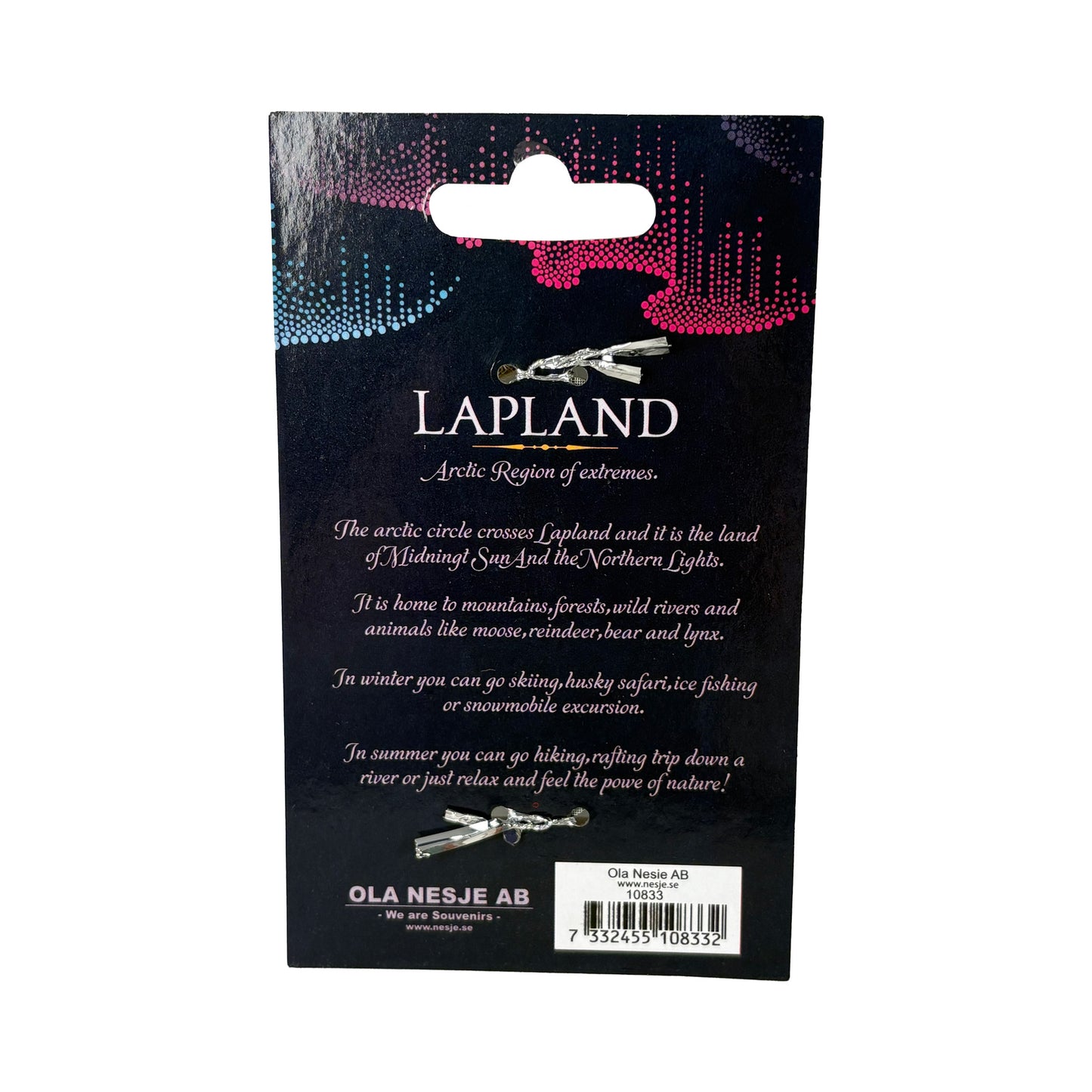 Baksida av förpackning till metalljuldekoration, med kort text om Lapland.