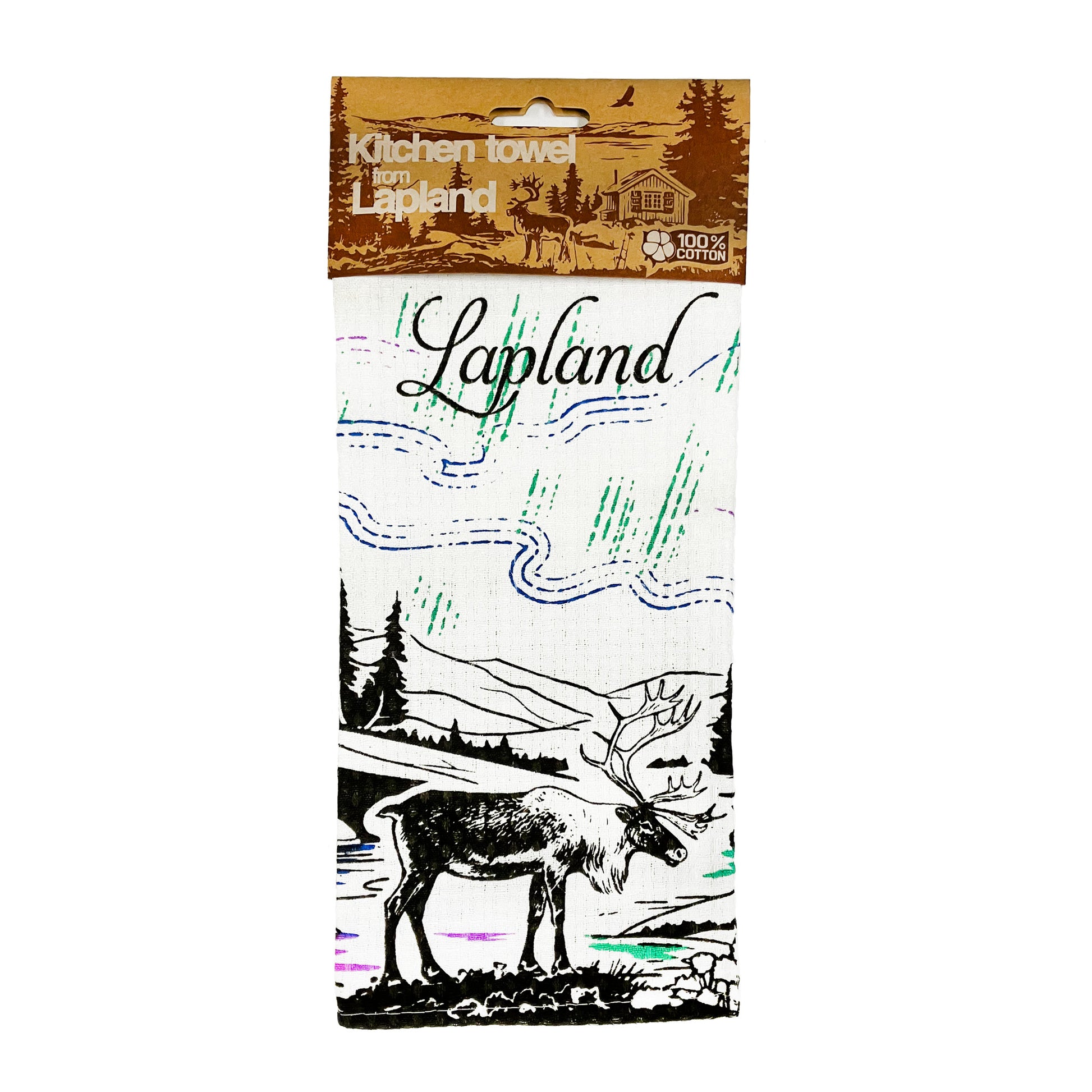 Vit kökshandduk med ren och texten Lapland, en vacker skogsvy och norrsken. Här med ljusbrun hängetikett med vackert skogsmotiv med ren och liten stuga i mörkbrunt. På etiketten finns texten "Kitchen Towel from Lapland" och "100 % cotton".