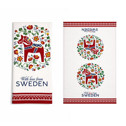 Kökshandduk med motiv på en dalahäst omgiven av blommor och texten "With love from Sweden". 