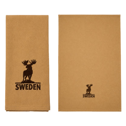 Beige kökshandduk med älgmotiv och texten "Sweden". Baksidan är beige utan motiv.