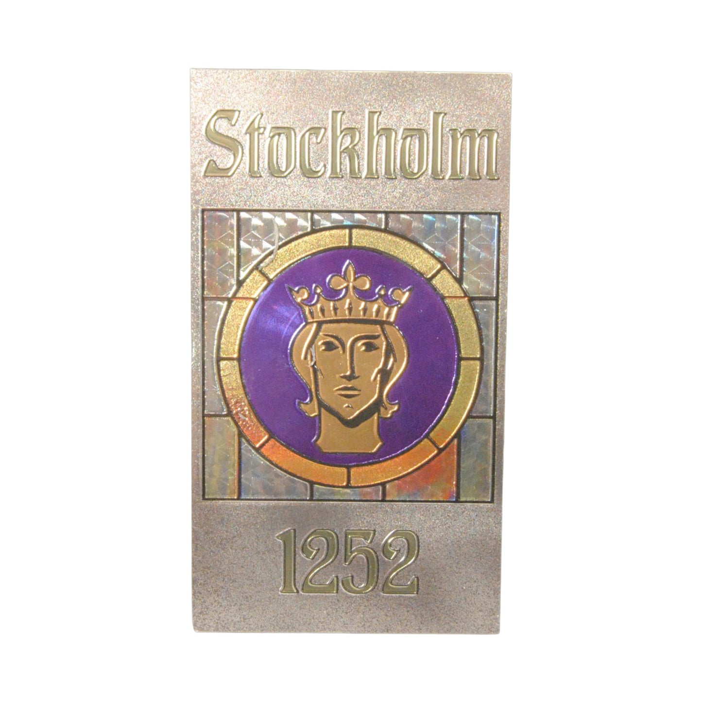 Souvenir­magnet från Stockholm med bild på S:t Erik och texten "Stockholm 1252".
