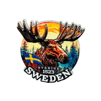 Magnet med ståtligt älghuvud och texten Sweden, sedd framifrån.