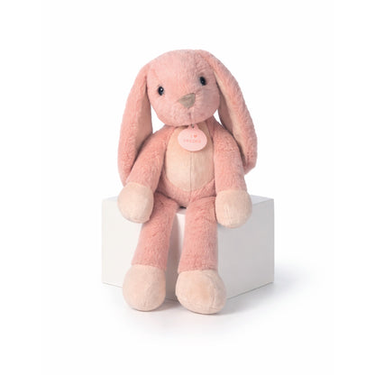 Rosa gosedjurskanin med långa ben, 35 cm lång. Mjuk och kramvänlig med gosig päls – en mysig vän som passar perfekt som present eller souvenir.
