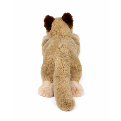 Beige liggande gosedjurs katt sedd bakifrån.