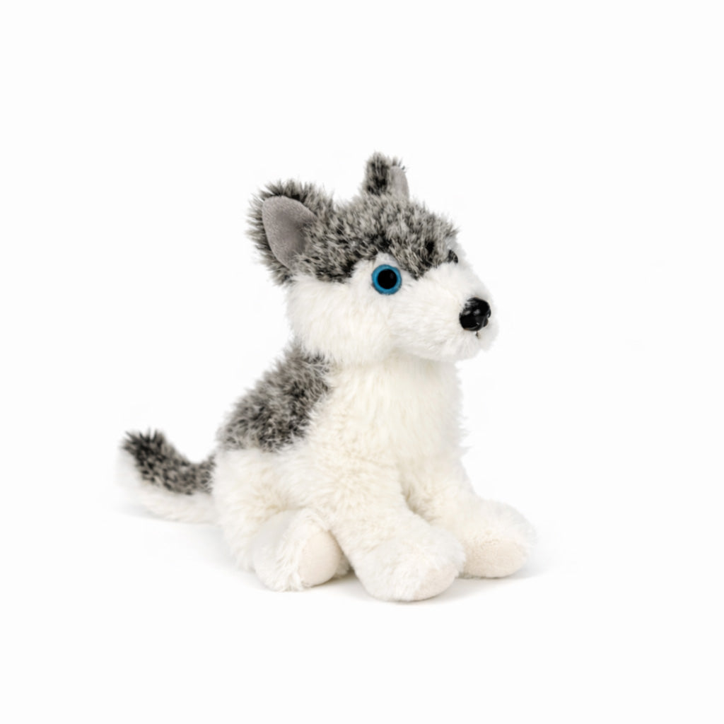 Liten grå gosedjurs husky på 17 cm sedd snett framifrån.