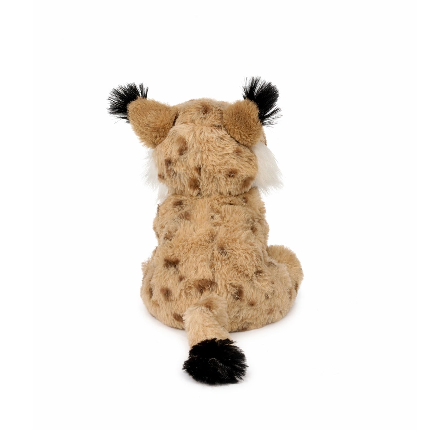 Beige sittande gosedjurs lodjur med bruna prickar och svarta tofsar på öronen, sedd bakifrån.