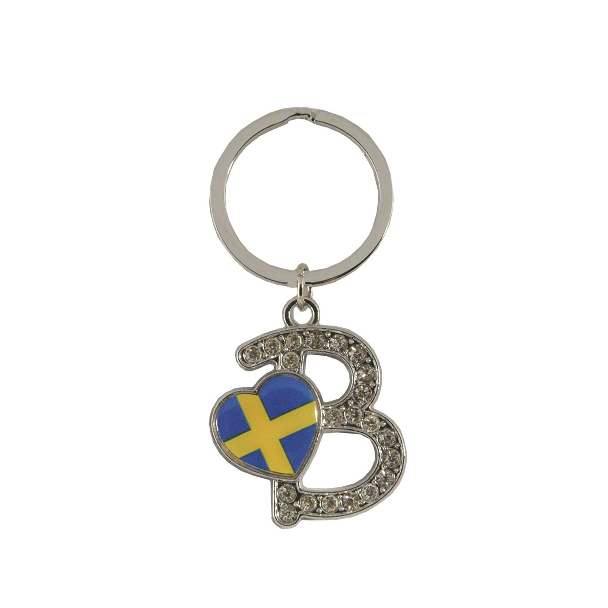 Metallnyckelring med bokstaven B. Bokstaven är dekorerad med glitterstenar. På bokstaven finns även ett hjärta med en svensk flagga. 