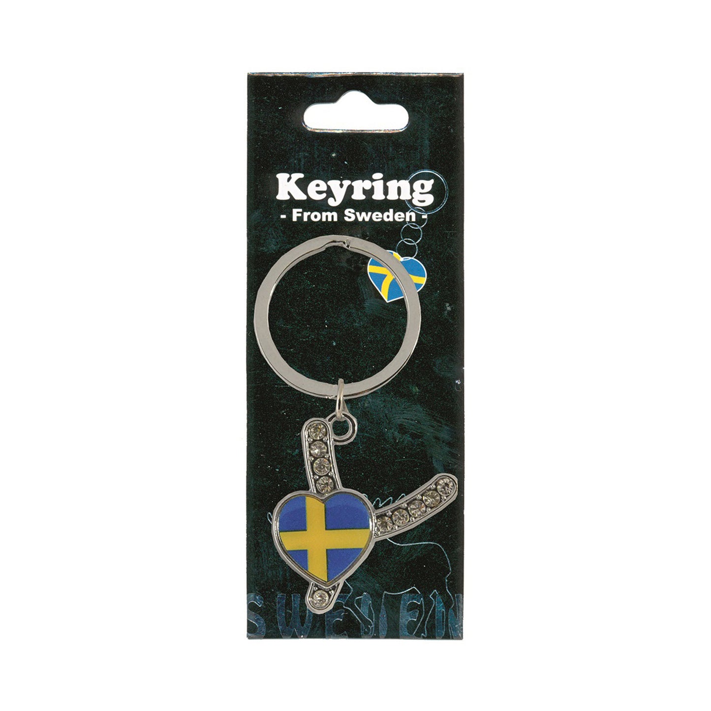 Metallnyckelring med bokstaven Y. Bokstaven är dekorerad med glitterstenar. På bokstaven finns även ett hjärta med en svensk flagga. Visas här i sin förpackning. Svart förpackning med  texten "Keyring från Sweden" i vitt.