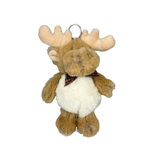 Gosedjursälg iklädd rödrutig rosett med nyckelring på huvudet. 