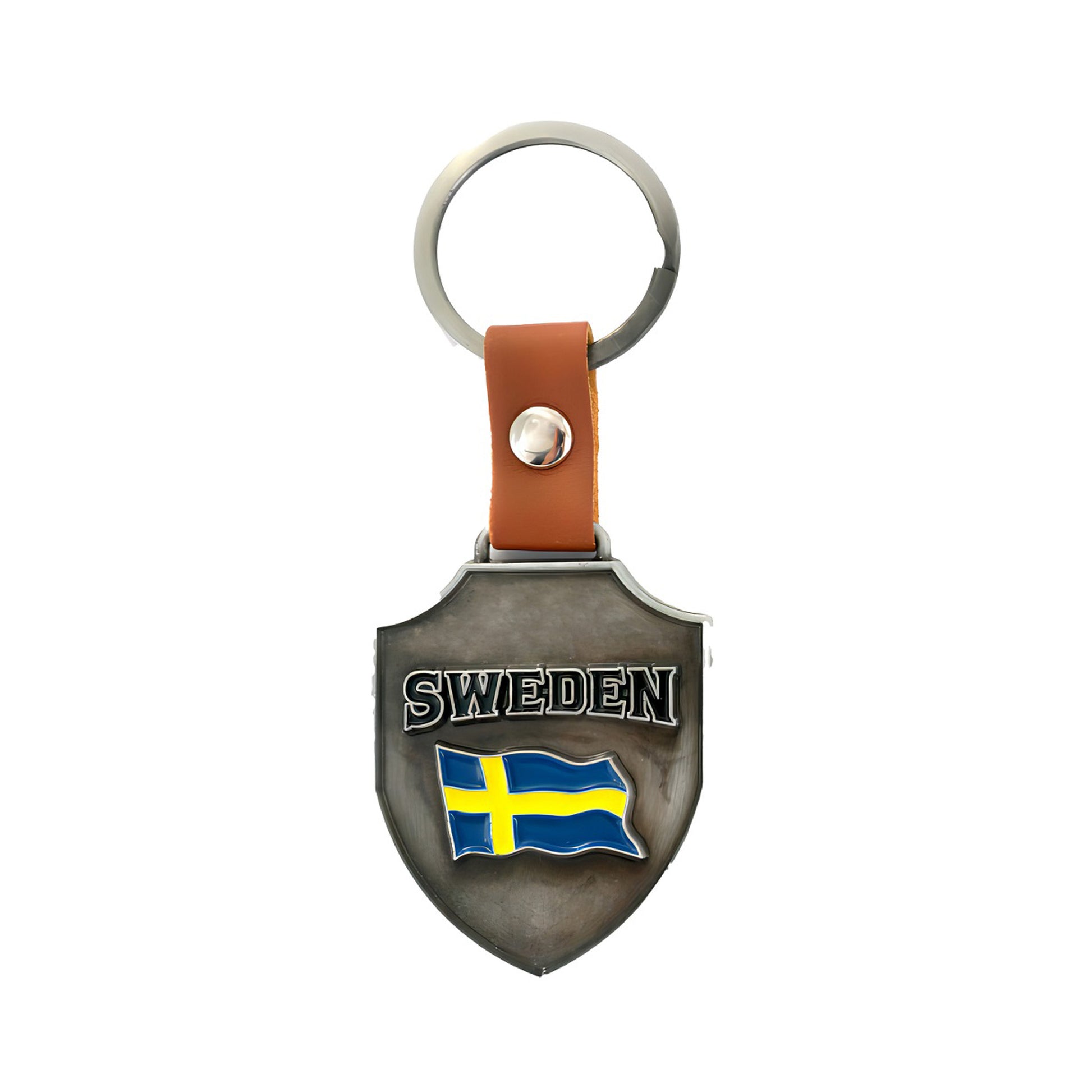 Framsidan av metallnyckelring i form av en sköld med svensk flagga i 2D-effekt och texten "Sweden".
