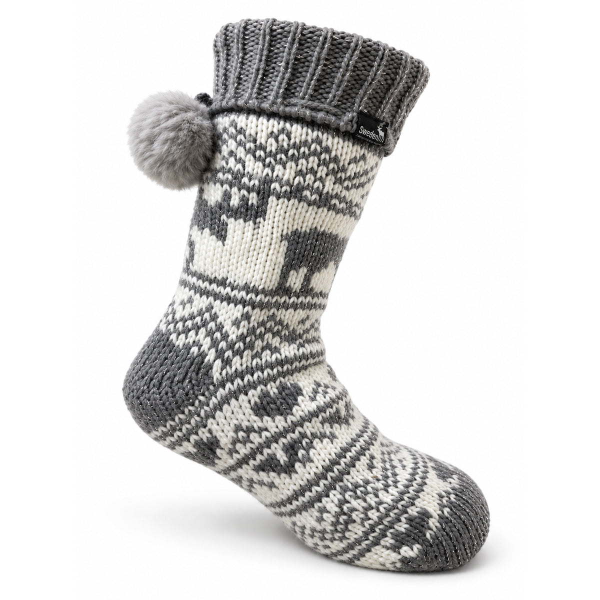 Vit stickad varmsocka med grått älgmönster, grå tå och häl, halkskydd och små grå pom poms upptill – storlek 36–40. En varm socka av hög kvalitet.