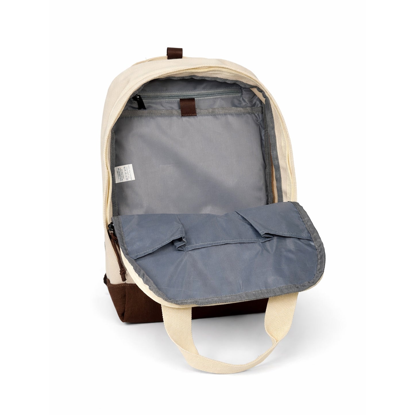 Insidan av beige ryggsäck med 5 olika innerfack. 