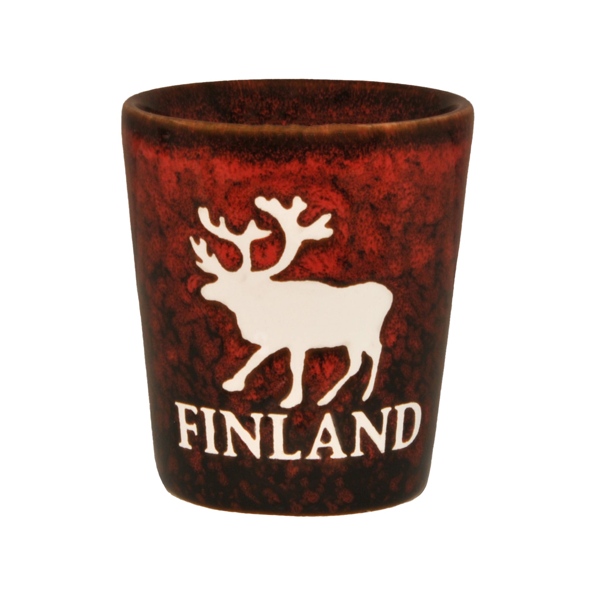 Rustikt rött shotglas med motiv av en ren och texten "Finland", perfekt för snaps eller shots. En festlig souvenir med finsk charm.