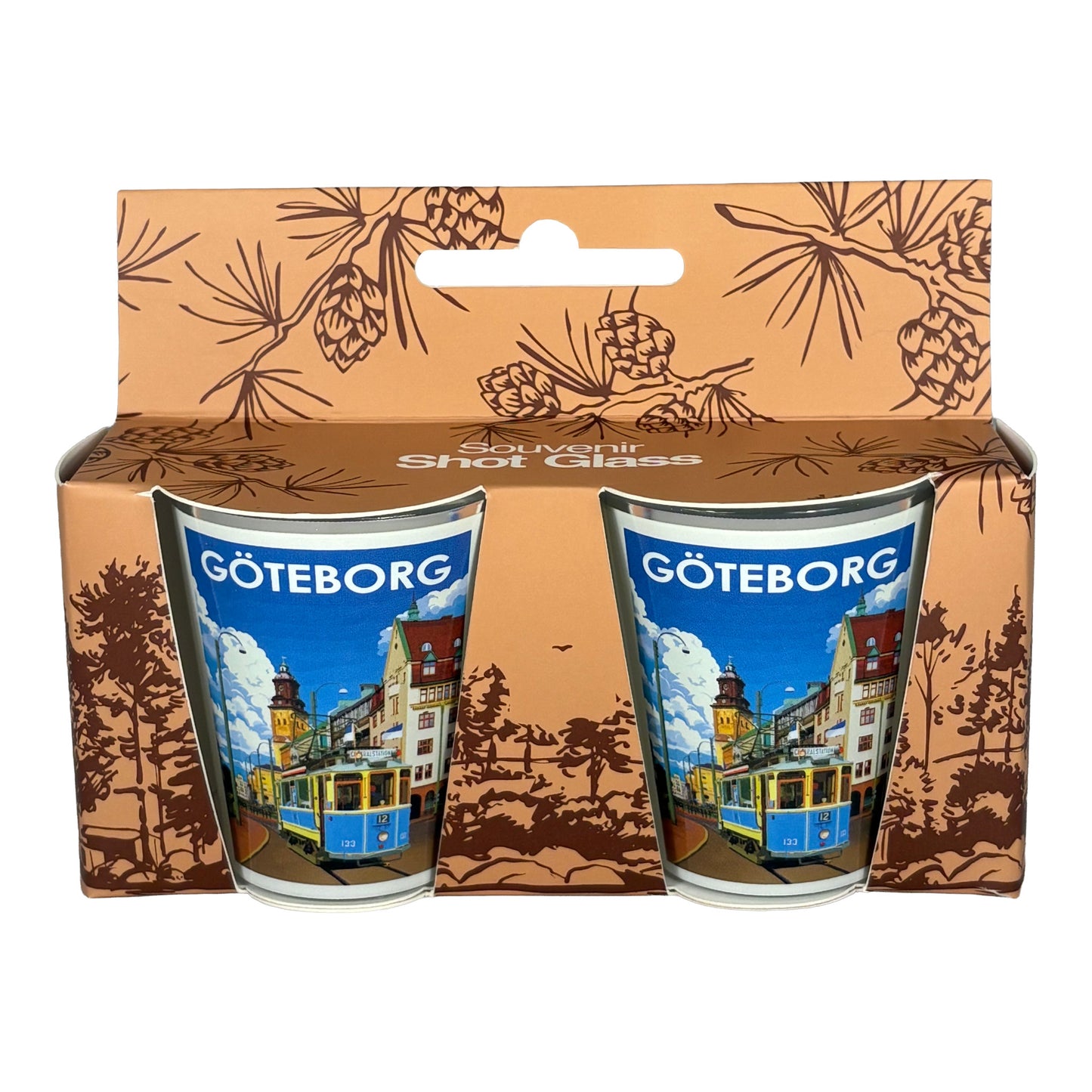 Två shotglas i förpackning med upphängningsögla för enkel exponering.