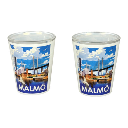 Två shotglas med motiv som fångar Malmös stadskaraktär och charm.