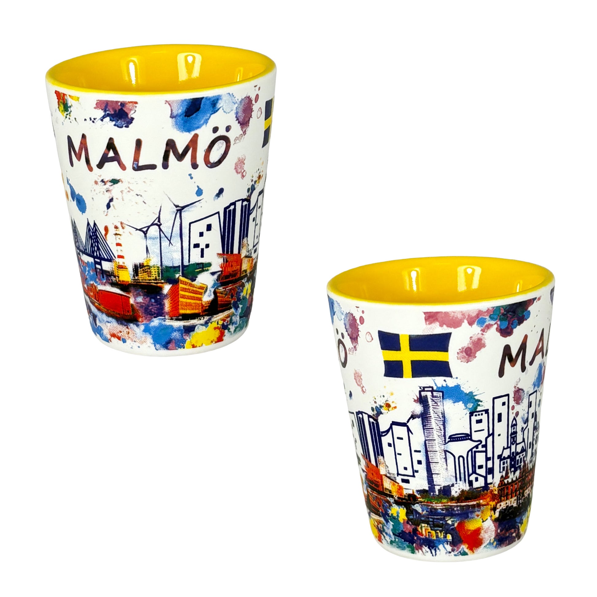 Shotglas med gul insida, visat från två vinklar för att visa hela det färgstarka Malmömotivet.