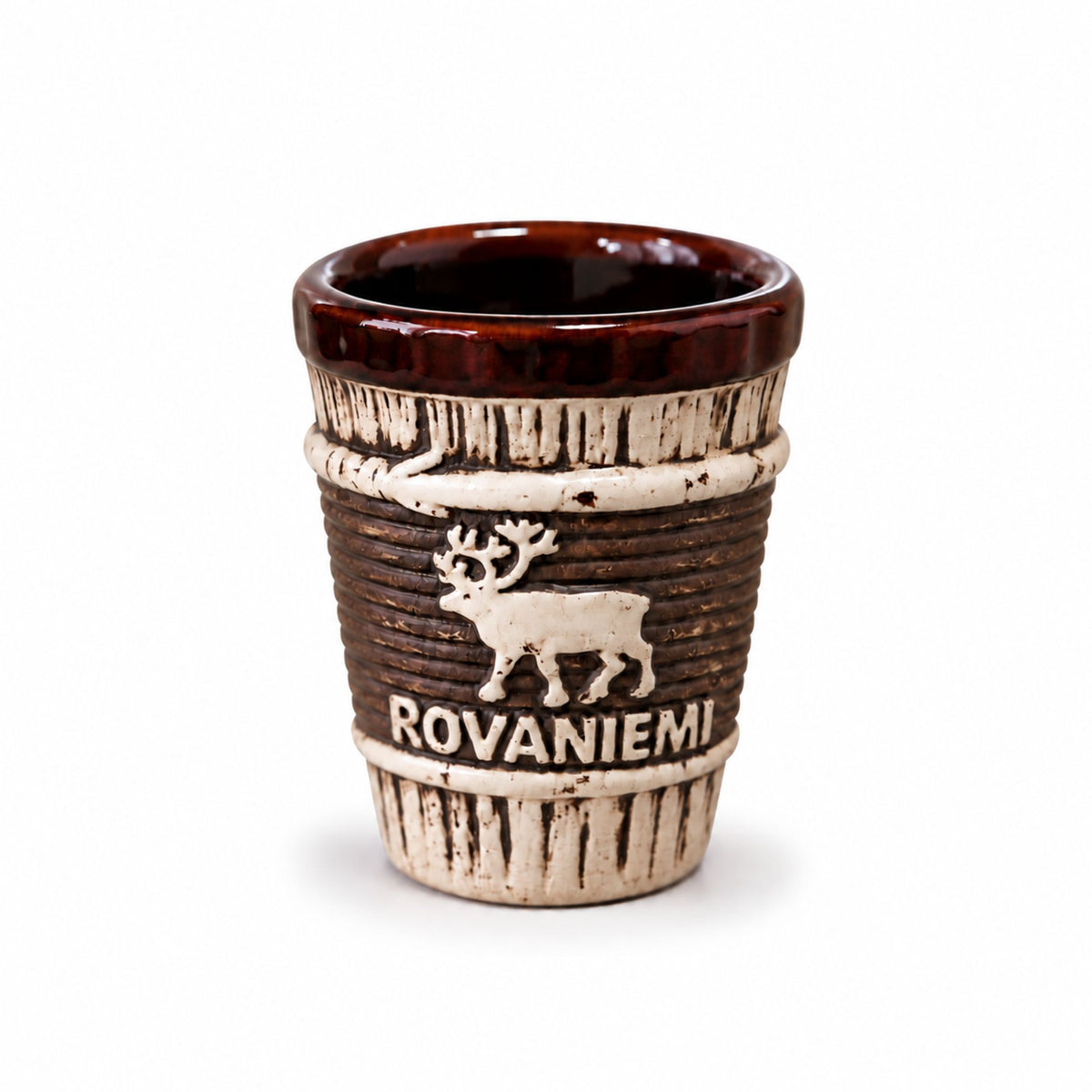 Shotglas med träinspirerad design och renmotiv samt texten Rovaniemi.