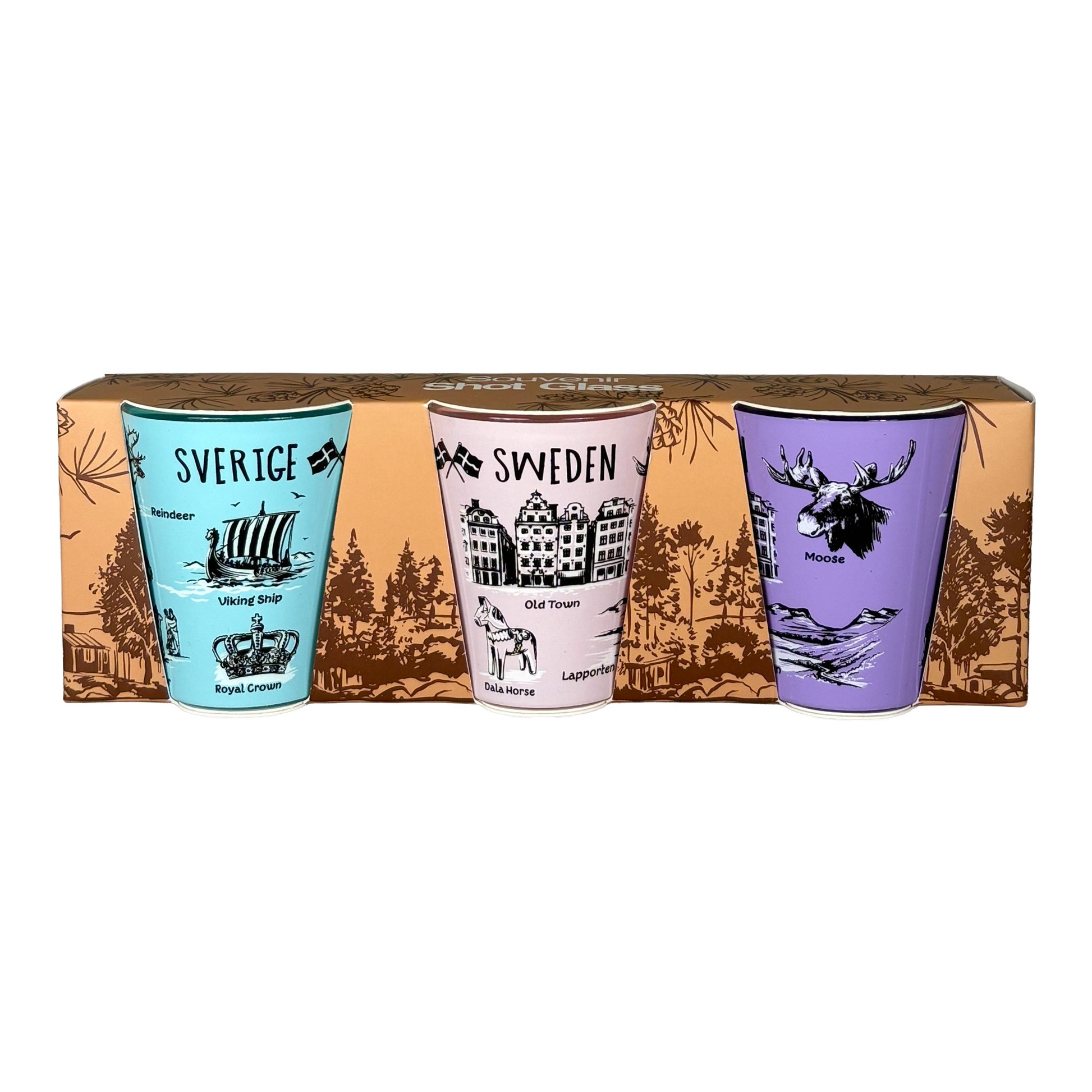 Shotglas 3-pack i förpackning, sett framifrån med de tre färgglada glasen tydligt synliga.