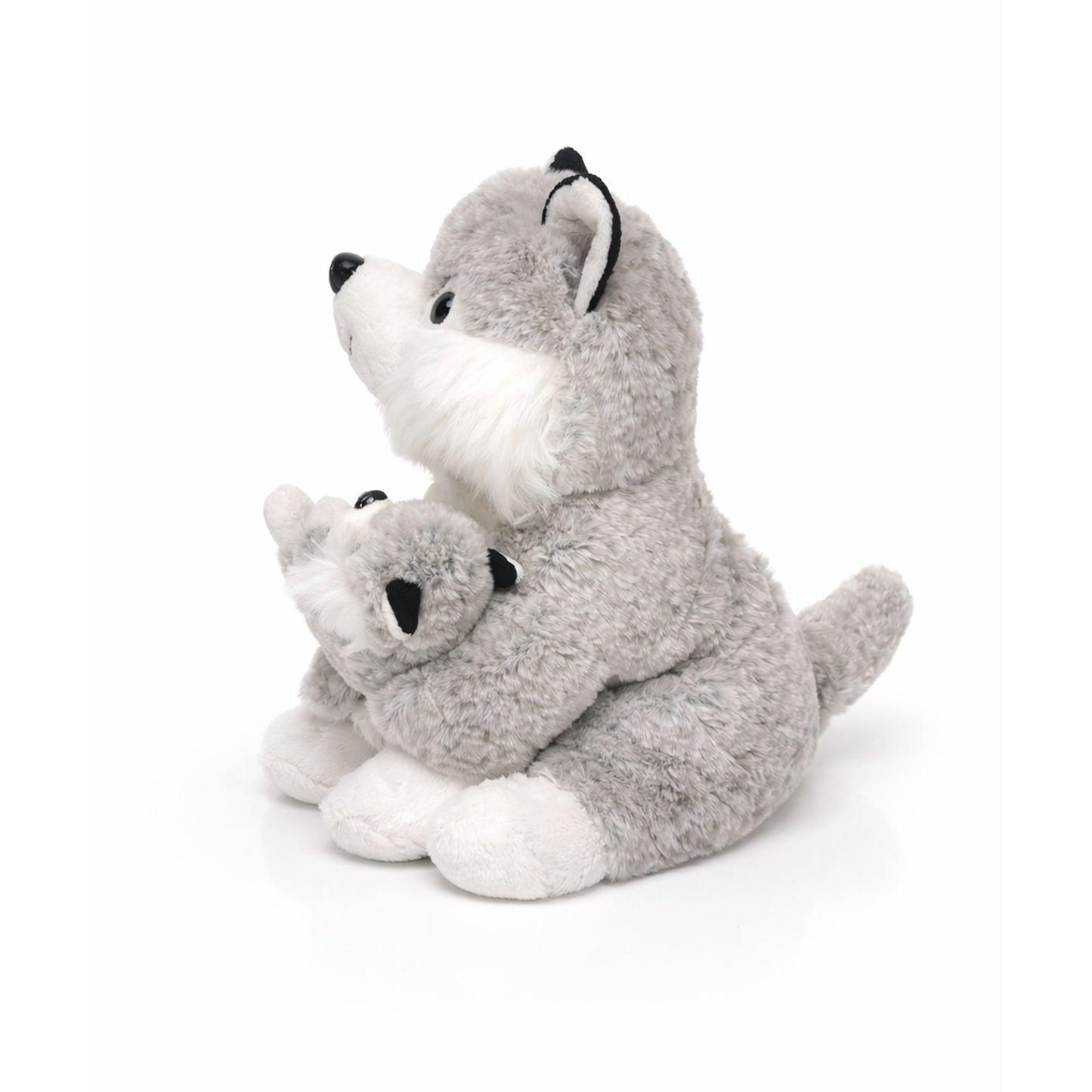 sittande husky-gosedjur på 25 cm med en liten baby, populär tack vare sitt gulliga utseende och mjuka material. Sedd från sidan